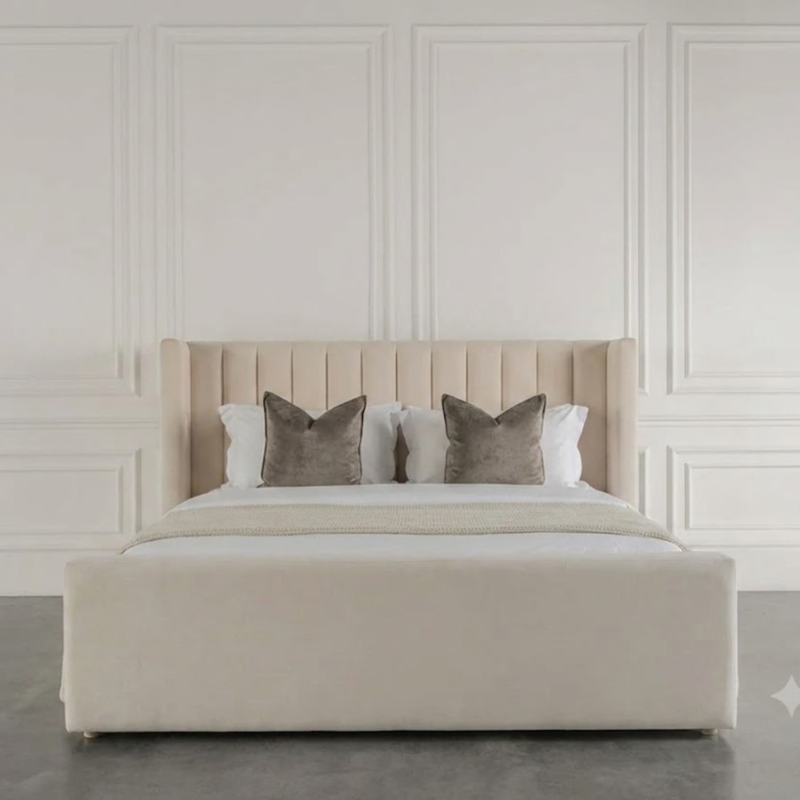 Belgrave Fluted Wing bed with vertical fluted headboard, deep wingback sides, and plush upholstered footboard