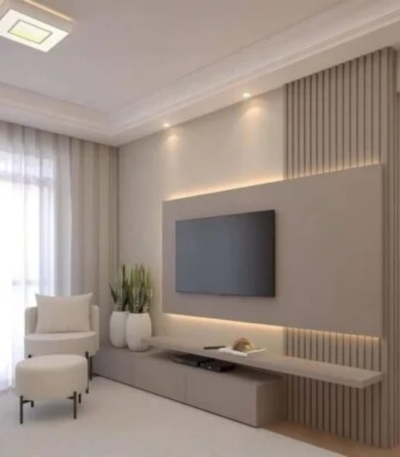 Modern floating TV unit with fluted cladding wall panel and minimalist storage cabinet by Bahoo Interior UAE.
